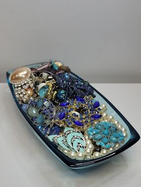 Beautiful Blue Glass Dish Filled With Jewelry